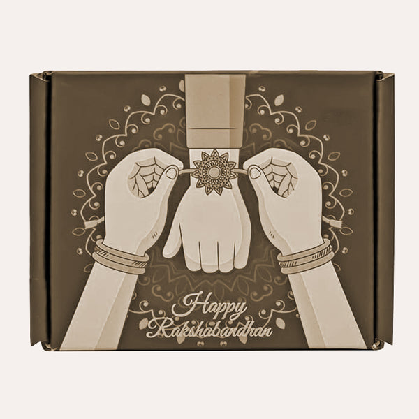 Rakhi Gold Plated Floral Rakhi with Roli Chawal and Raksha Bandhan Greeting Card For Men